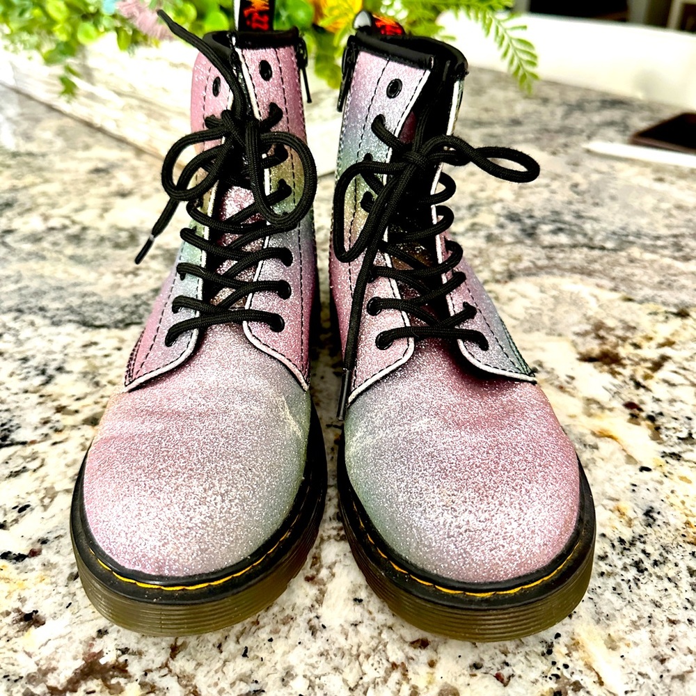 Dr. Martens Rainbow Glitter combat boots.
